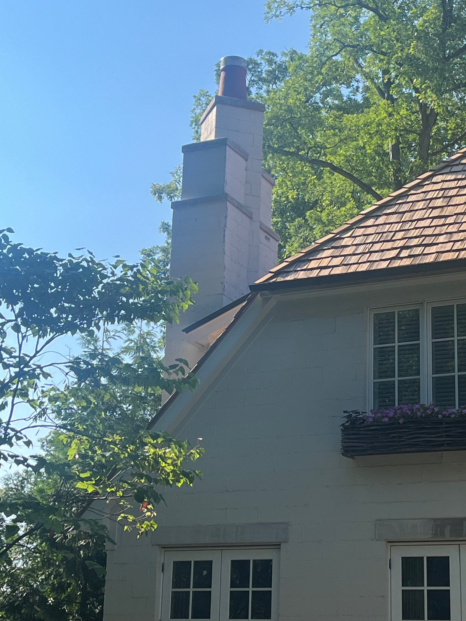 Chimney on white luxury home